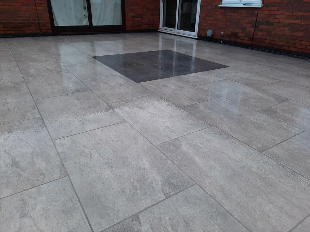 Case Study grey quartz and anthracite porcelain slabs paved area