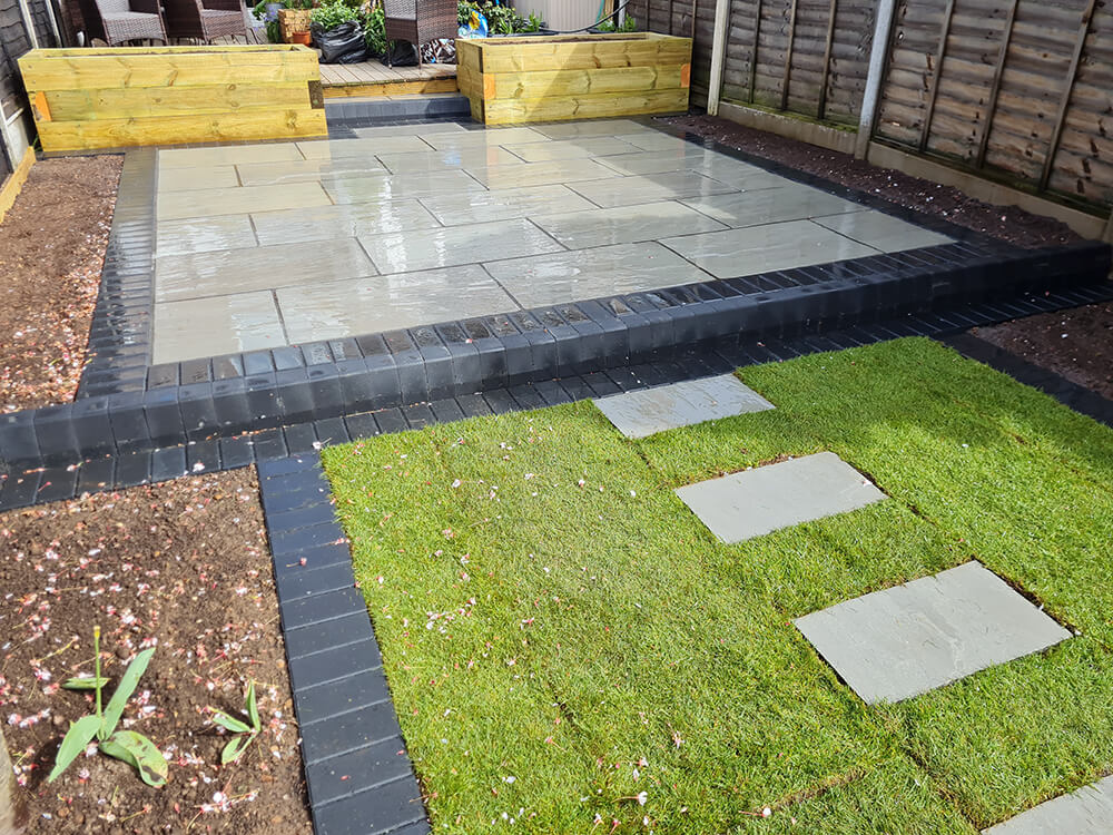 Case Study landscape garden transformation sandstone slabs in grey