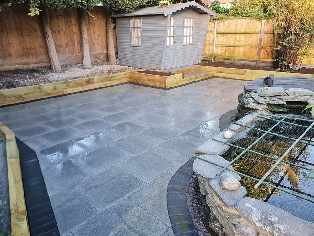 Case Study complete garden transformation concrete slabs in graphite